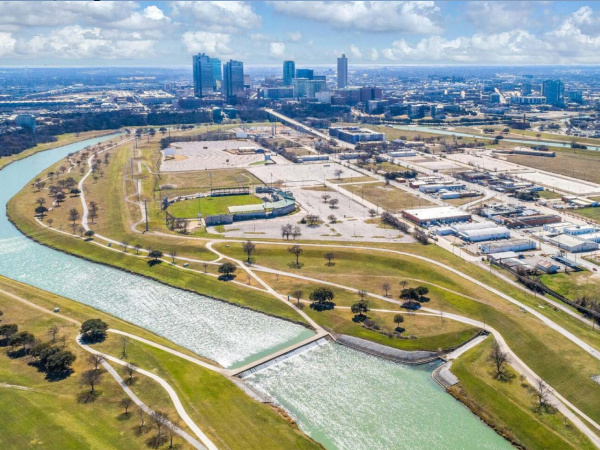 Lake Flato plans to create _vibrant, mixed-use waterfront district_ on Fort Worth Island